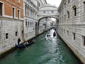 Gondolas Passing Under the Bridge of Sighs, Venice, Italy Royalty Free Stock Photo