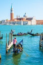 Gondolas sail near the San Marco Square, Venice, Italy