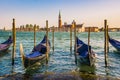 Gondolas with San Giorgio di Maggiore church in the background. Venice, Venezia, Italy, Europe. Royalty Free Stock Photo