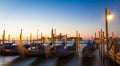 Gondolas at sunrise with San Giorgio di Maggiore church, Venice, Venezia, Italy Royalty Free Stock Photo