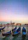 Gondolas at sunset with San Giorgio di Maggiore church, Venice, Venezia, Italy Royalty Free Stock Photo