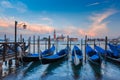 Gondolas at twilight in Venice lagoon, Italia