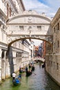 Gondolas under the Bridge of Sighs, a romantic tradition in Venice Royalty Free Stock Photo