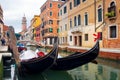 Gondolas in Venice canal. Venetian traditional gondola. Venezia cityscape, Italy Royalty Free Stock Photo