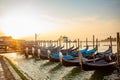 Gondolas of Venice Italy in the morning against the backdrop of sunrise