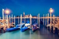 Gondolas in Venice, Italy at night. Royalty Free Stock Photo