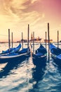 Gondolas in Venice, Italy at sunset. Royalty Free Stock Photo
