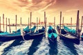 Gondolas in Venice, Italy at sunset. Royalty Free Stock Photo