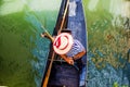 Gondolier in a boat. Top view from the bridge.