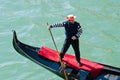 Gondolier on gondola in Venice italy