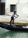 Gondolier on the grand canal, Venice Italy Royalty Free Stock Photo