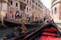 Gondolier and tourists in a gondola