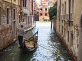 Gondolier in a Venice canal close-up Royalty Free Stock Photo