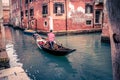 Gondolier in Venice at early morning