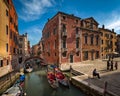 Gondolier waiting for tourists near his Gondolas in Venice, Ital Royalty Free Stock Photo