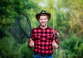 Gone Fishing. fisherman with fishing rod. happy man in cowboy hat. western portrait. Vintage style man. Wild West retro Royalty Free Stock Photo