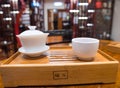 Gong Fu Cha brewing. Beautiful white porcelain Gaibei/ Gaiwan Royalty Free Stock Photo