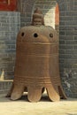 Large old bell at the Gongyi Caves