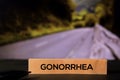 Gonorrhea on the sticky notes with bokeh background