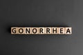 Gonorrhea - word from wooden blocks with letters