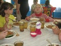 Good appetite for children in the summer camp, relax and dine together. Royalty Free Stock Photo