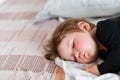 Good baby sleep. Good dreaming new born baby sleep on white towel. New generation of asean people health from first day in life Royalty Free Stock Photo