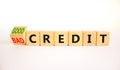 Good or bad credit symbol. Turned wooden cubes and changed concept words Bad credit to Good credit. Beautiful white table white Royalty Free Stock Photo