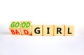 Good or bad girl symbol. Concept word Good girl Bad girl on wooden cubes. Beautiful white table white background. Business Royalty Free Stock Photo