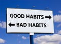 Good or bad habits symbol. Concept word Good habits Bad habits on beautiful billboard with two arrows. Beautiful blue sky with Royalty Free Stock Photo