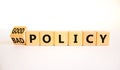 Good or bad policy symbol. Turned wooden cubes and changed concept words Bad policy to Good policy. Beautiful white table white Royalty Free Stock Photo