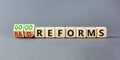 Good or bad reforms symbol. Concept words Good reforms Bad reforms on beautiful wooden blocks. Beautiful grey table grey