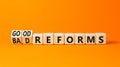 Good or bad reforms symbol. Concept words Good reforms Bad reforms on beautiful wooden blocks. Beautiful orange table orange