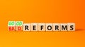 Good or bad reforms symbol. Concept words Good reforms Bad reforms on beautiful wooden blocks. Beautiful orange table orange