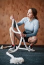 In good body shape. Sportive young woman have fitness day in the gym at morning time Royalty Free Stock Photo