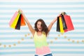 A good buy. happy girl show shopping bags. happy girl after day shopping with good buy. woman with purchase after sale