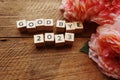 Good Bye 2023 word letter with space copy on wooden background Royalty Free Stock Photo