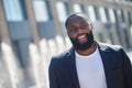 African american young man smiling and looking contented Royalty Free Stock Photo