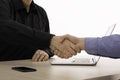 Good deal. Two confident business man shaking hands during a meeting in the office, success, dealing, greeting and partner concept Royalty Free Stock Photo