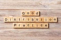 Good distribution practice word written on wood block. good distribution practice text on table, concept Royalty Free Stock Photo