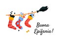 Good Epiphany. Greeting card with full socks of coals and sweets flying on broom. Royalty Free Stock Photo