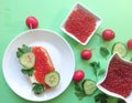 Red caviar of salmon fish, sandwich, cucumber, parsley. Royalty Free Stock Photo