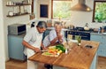 Good food never lacks company. a happy mature couple cooking a meal together at home. Royalty Free Stock Photo