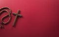 Good Friday and Holy week concept - A religious cross on dark red background