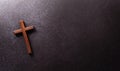 Good Friday and Holy week concept - A religious cross on dark stone background