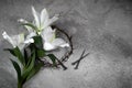 Good Friday, Passion of Jesus Christ. Crown of thorns, nails and white lily. Christian Easter holiday. Royalty Free Stock Photo