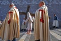 the Good Friday procession in Assisi with the penitent cross-bearer and members of the lay confraternities Royalty Free Stock Photo