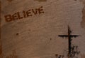 Beach Sand Background with Cross and Believe