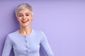 good-humored caucasian lady with short hair laughing, enjoying life, having fun