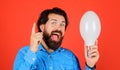 Good idea. Happy man with light bulb. Bearded male with lamp pointing finger up. Guy with lightbulb. Royalty Free Stock Photo