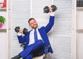 Good job concept. Boss businessman office manager raise hands with dumbbells. Boost business. Boost your managing skill Royalty Free Stock Photo